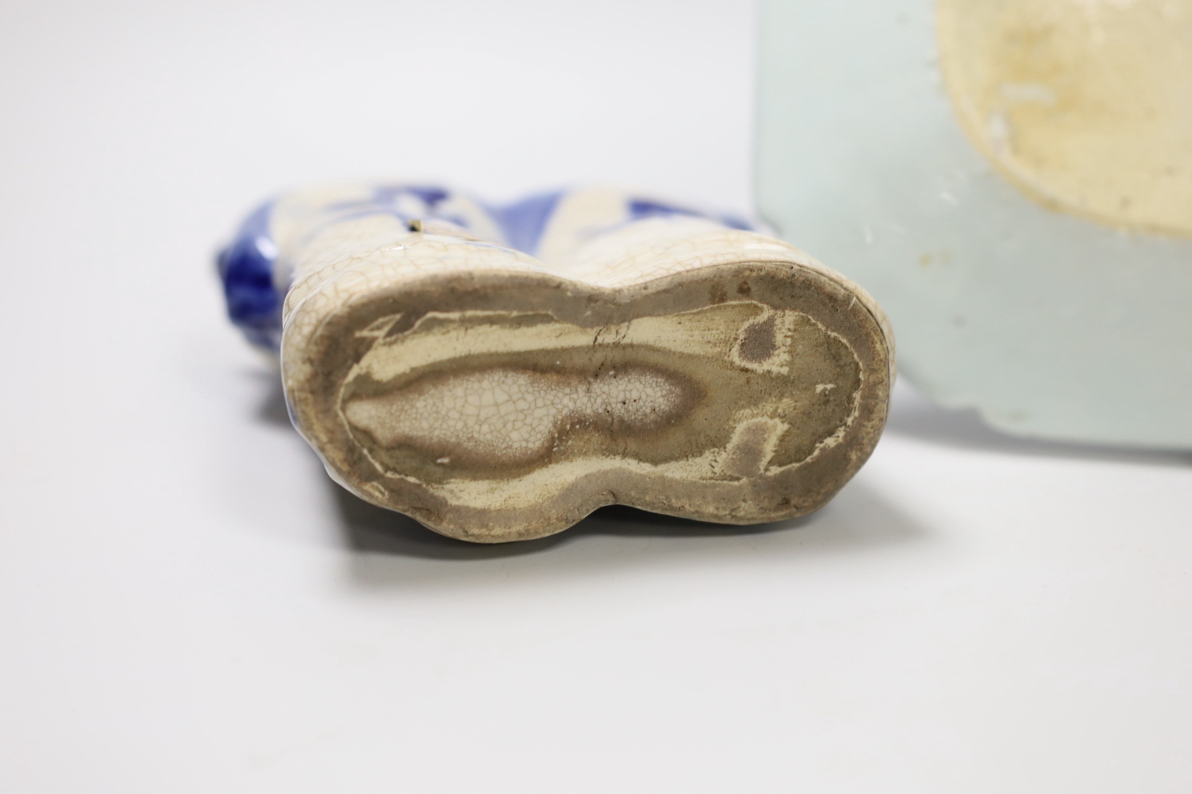 A Chinese blue and white dish, Qianlong period, and He He Erxian jossstick holder. Tallest 15.5cm